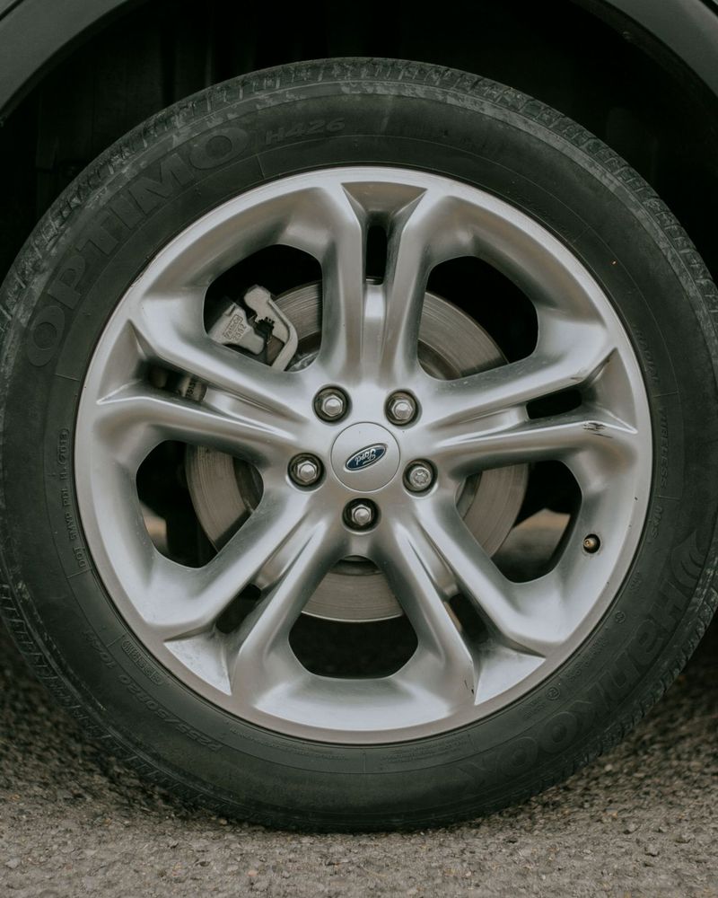 Alloy wheel and tire on a passenger vehicle